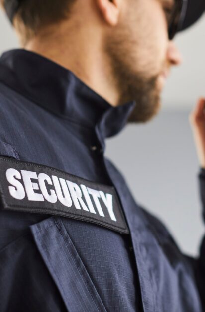 Close,Up,Cropped,Portrait,Of,Confident,Male,Security,Guard,Standing